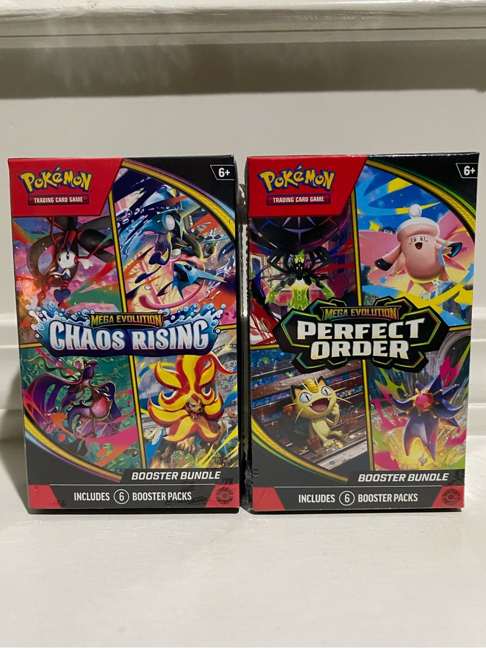 One (1) Chaos Rising AND One (1) Perfect Order Booster Bundle